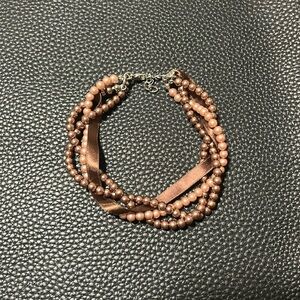 Purple and pink beaded bracelet